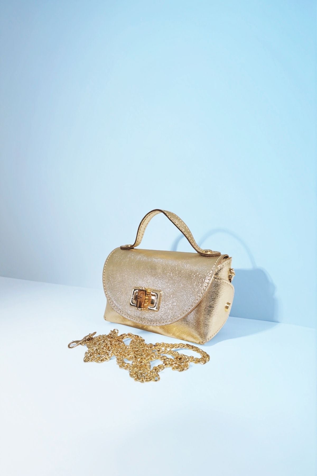 Ama - Sac en cuir de vachette doré